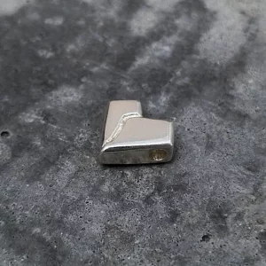 sandcast silver broken heart medal