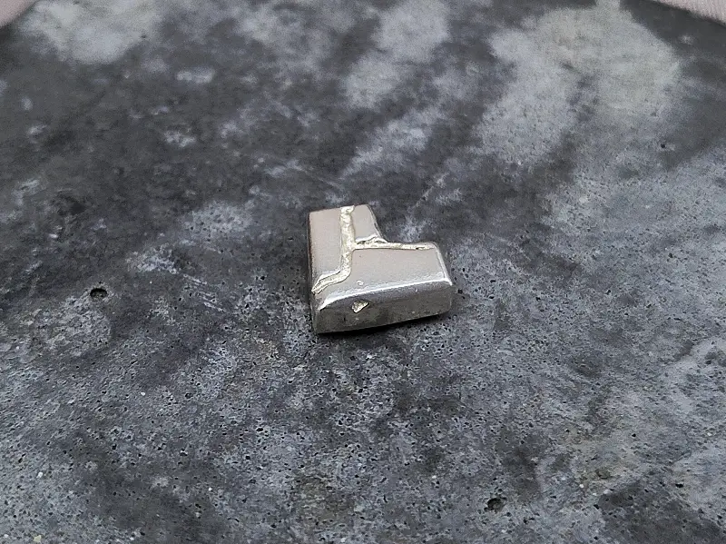sandcast silver broken heart medal